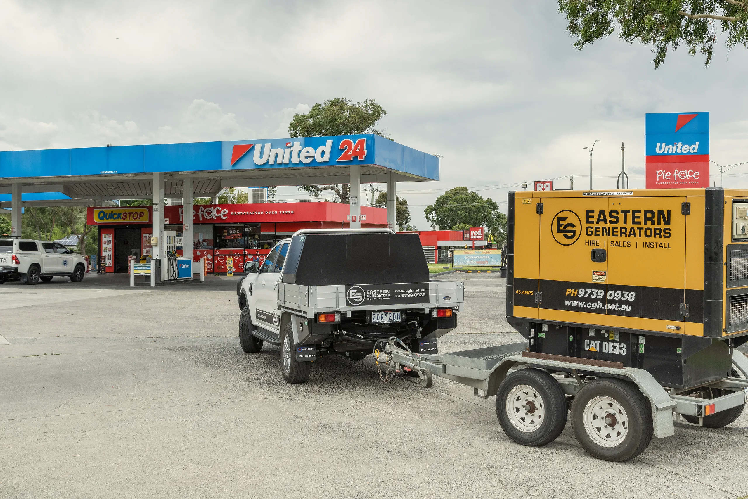 An Eastern Generators ute towing a trailer-mounted generator