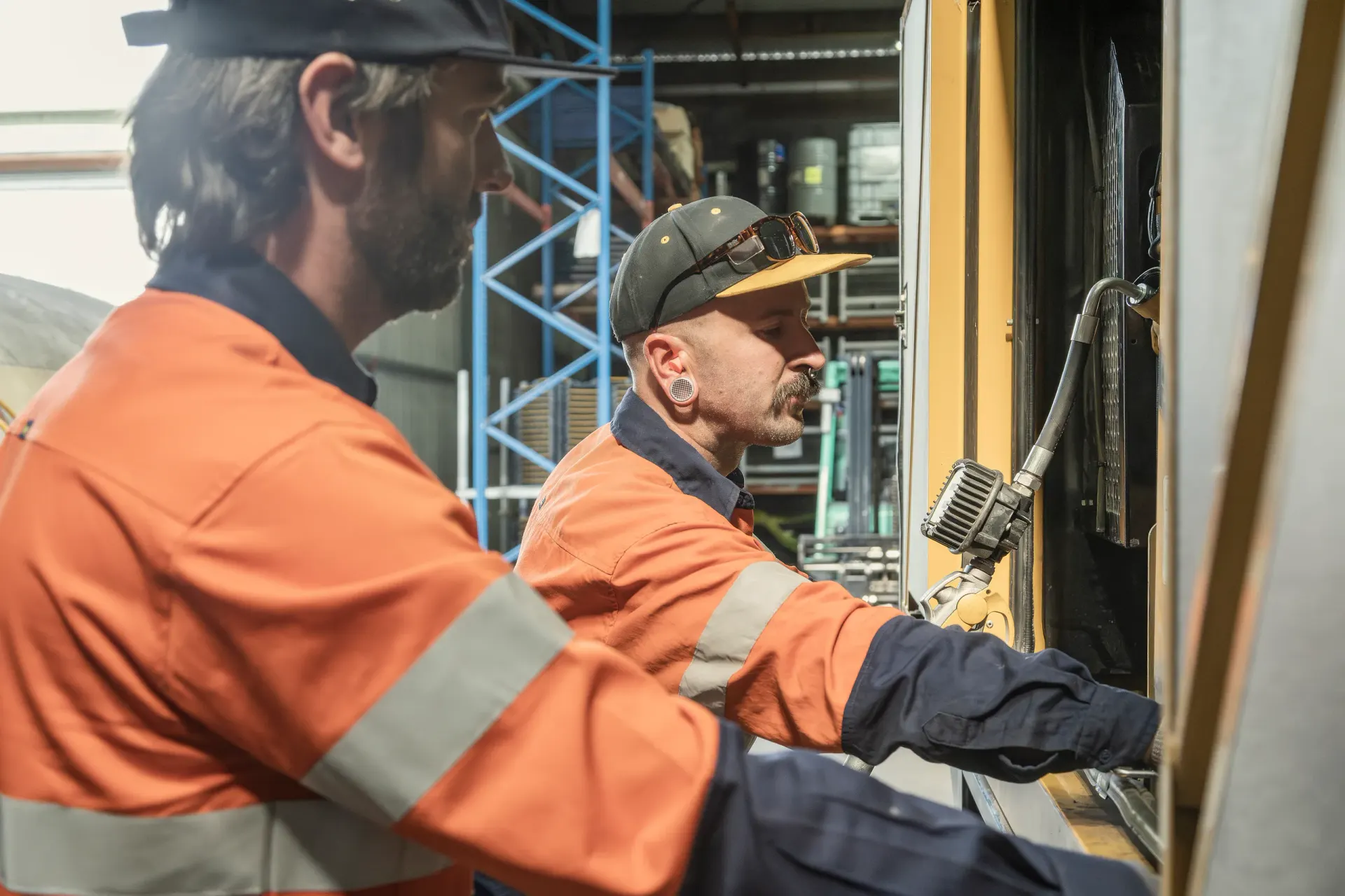 Construction workers in hi-vis on site