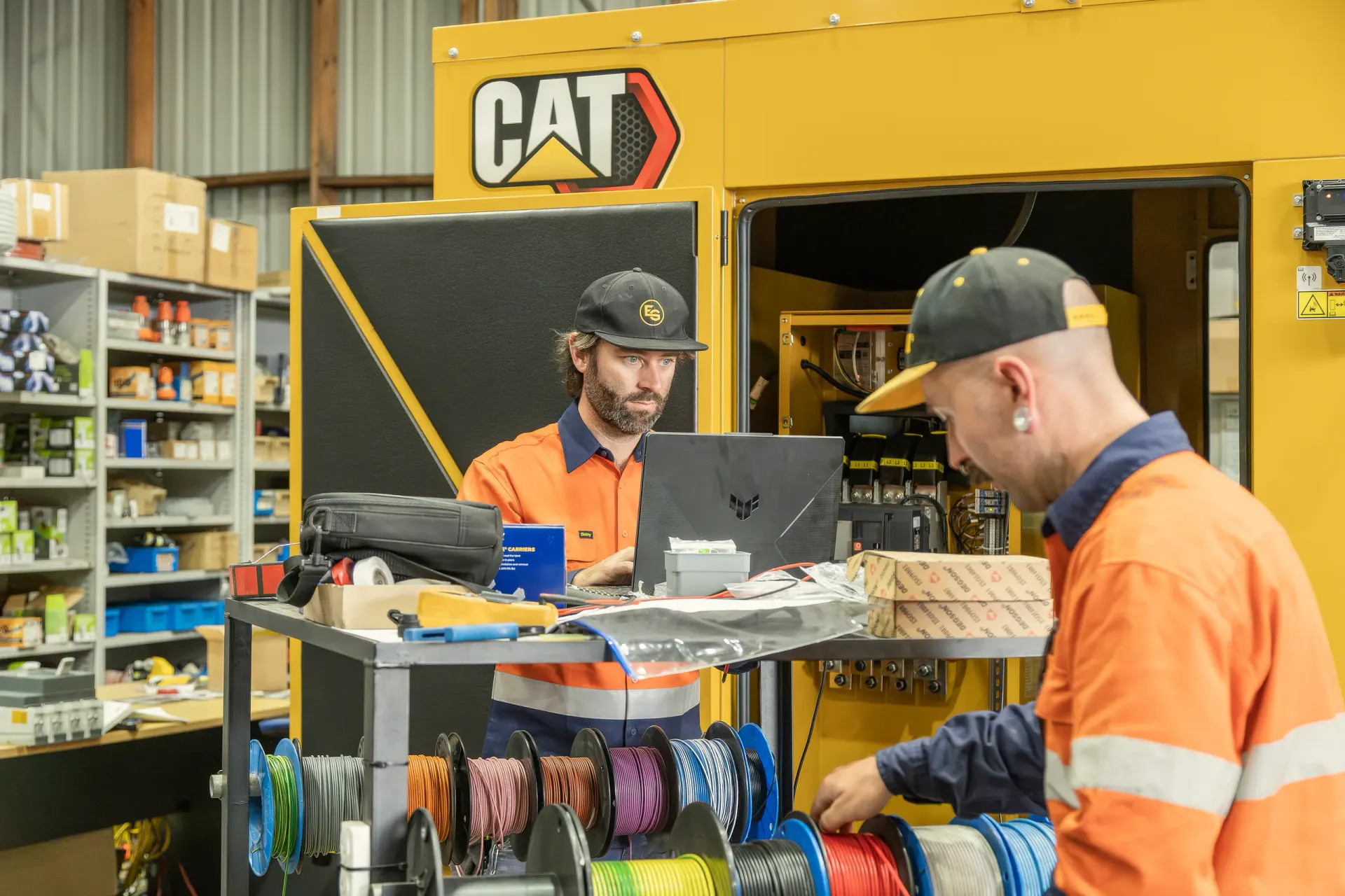 Eastern Generators crew working at the bench in the workshop