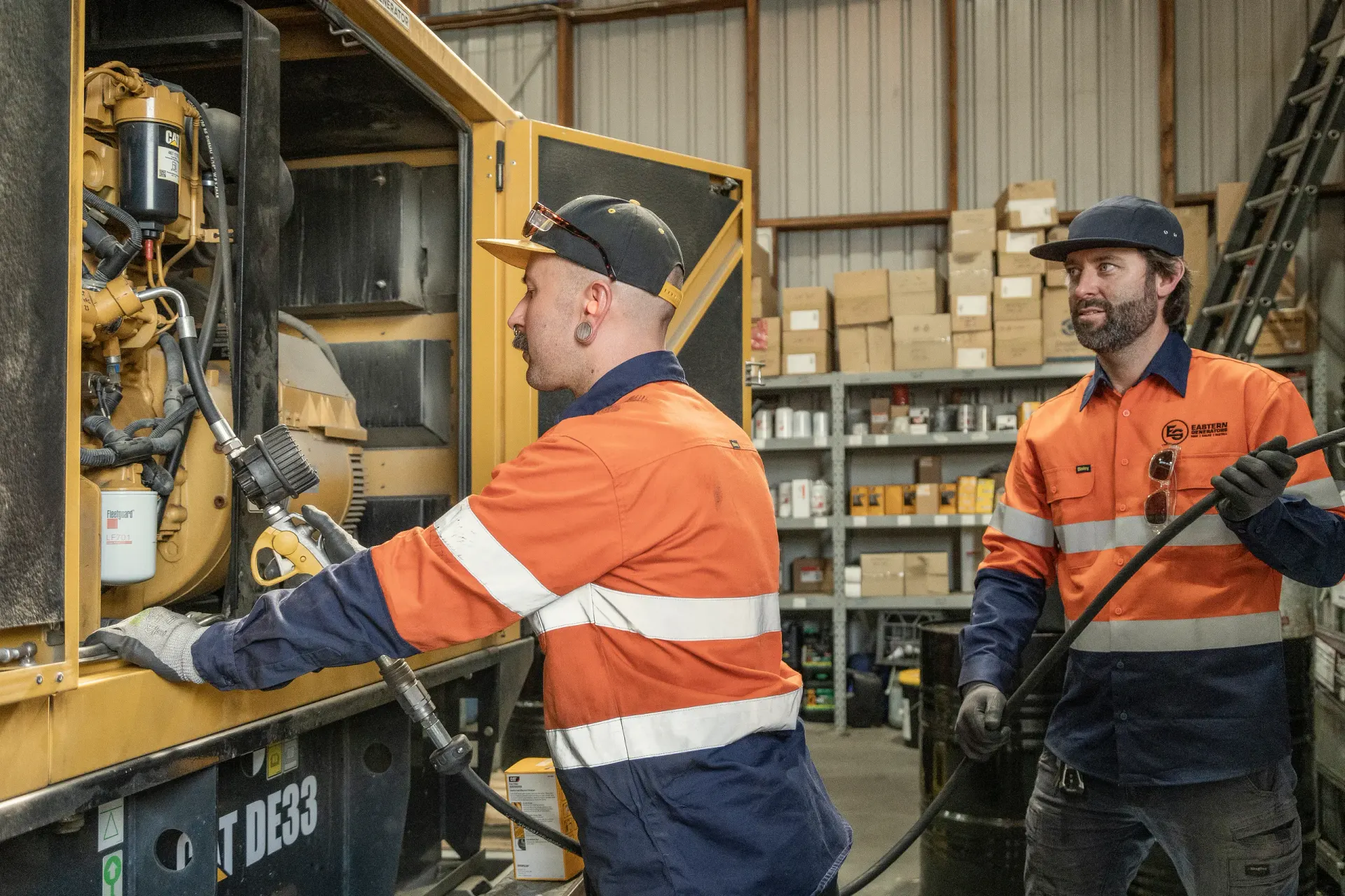 Eastern Generators technicians carrying out scheduled maintenance on a generator